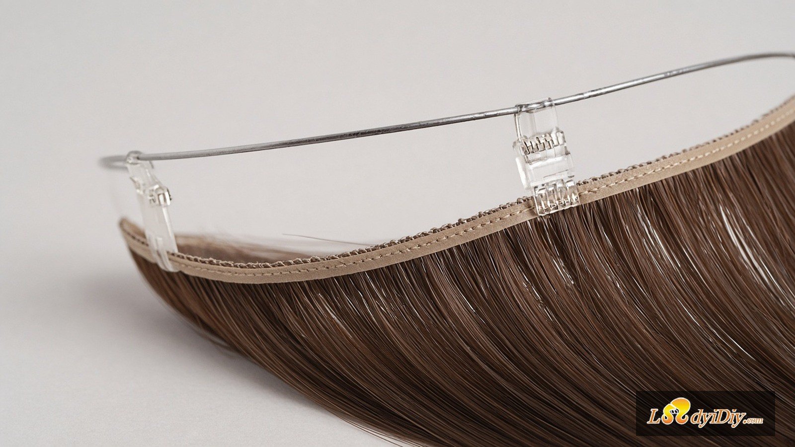 Close-up of Ladyidiy Halo Secret Wire with supporting clips on PU weft Remy hair piece