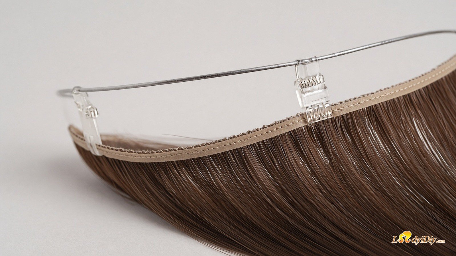 Close-up of Ladyidiy Halo Remy Secret Wire with clear clips on PU weft band